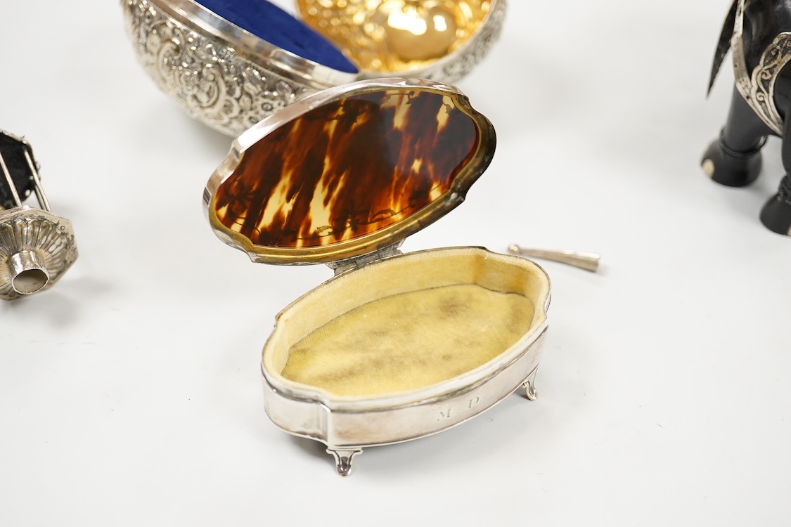 A George V engraved silver rectangular tea caddy, by Nathan & Hayes, Chester, 1913, 81mm, together with an Edwardian repousse silver mounted ring box by Nathan & Hayes, Chester, 1905, a Scottish silver and tortoiseshell